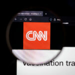 CNN logo magnified on a computer screen.