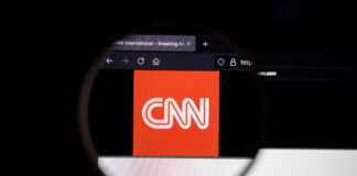 CNN logo magnified on a computer screen.