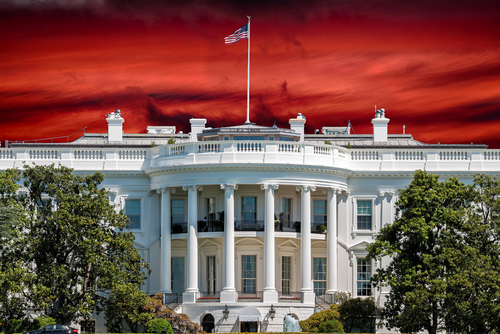 shutterstock_382759327.jpg The White House with an American flag against a dramatic red sky