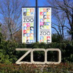 Smithsonians National Zoo entrance with colorful banners.