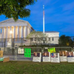 Protest signs outside the U.S. Supreme Court building.