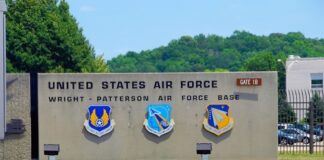 Entrance sign of Wright-Patterson Air Force Base with military emblems