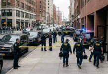 Courthouse Arrest Follows Viral Trial Clash FBI agents conducting an operation at a city street crime scene