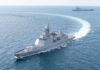 U.S. Fires on Tanker During Iran Blockade Enforcement, Raising Global Tensions Warships maneuvering at sea, leaving a white wake.