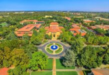 Viral Bodycam Footage Turns Campus Arrest Aerial view of a university campus with central fountain and red-tiled buildings