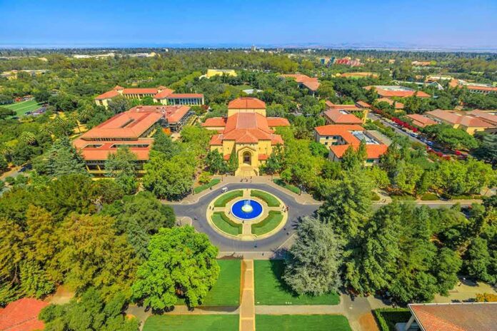 shutterstock_1237524022 Aerial view of a university campus with central fountain and red-tiled buildings