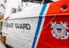 U.S. Coast Guard ship docked at port.