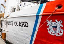 U.S. Coast Guard ship docked at port.