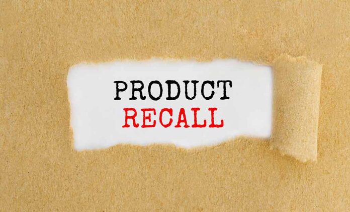 Product Recall text revealed under torn paper