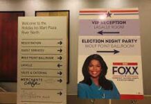 Election night party sign for Kim Foxx.