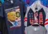 Trump T-shirt and USA hoodie display in store.