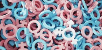 Pink and blue gender symbols scattered together.